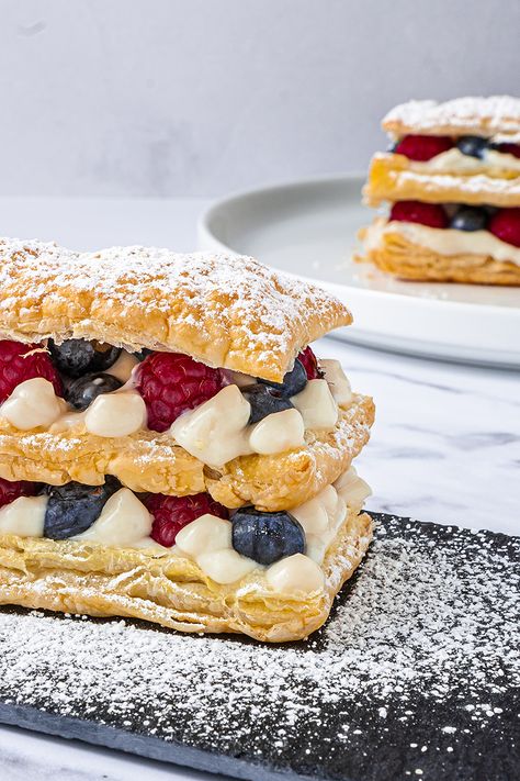 This vegan mille-feuille recipe with raspberries and almond cream filling is as delicious as it's easy to make. Bake it ahead and impress your guests! vegan mille feuille,mille feuille recipe easy,mille feuille recipe napoleon,mille feuille with berries,vegan dessert easy,mille feuille with raspberries,mille feuille with almond creme patissiere #vegan #govegan #dairyfree #glutenfree #recipe #cooking #food Vegan Mille Feuille, Vegan Dessert Easy, Mille Feuille Recipe, Almond Cream Filling, Fibre Recipes, High Calorie Desserts, Napoleon Pastry, Classic Puff Pastry, Almond Creme