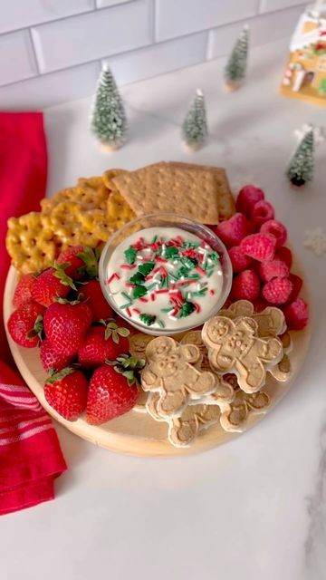 Erin | Recipe Developer & Tester on Instagram: "⛄️CANNOLI DIP BOARD⛄️ Tis the season for holiday boards! Trader Joe’s Cannoli dip is a real crowd pleaser and perfect to put out for a party with all kinds of fun dippers. Today I am using a combo of the Mini Gingerbread People, Graham Crackers, Pretzel Slims, and fresh berries but anything goes. To add some extra festive flair, spoon your dip into a cute bowl and top with holiday sprinkles before arranging your surrounding dippers. Have you tried Dip Board, Holiday Boards, Cannoli Dip, Recipe Developer, Cannoli Cream, Gingerbread People, Trader Joes Recipes, Holiday Sprinkles, Trader Joe’s