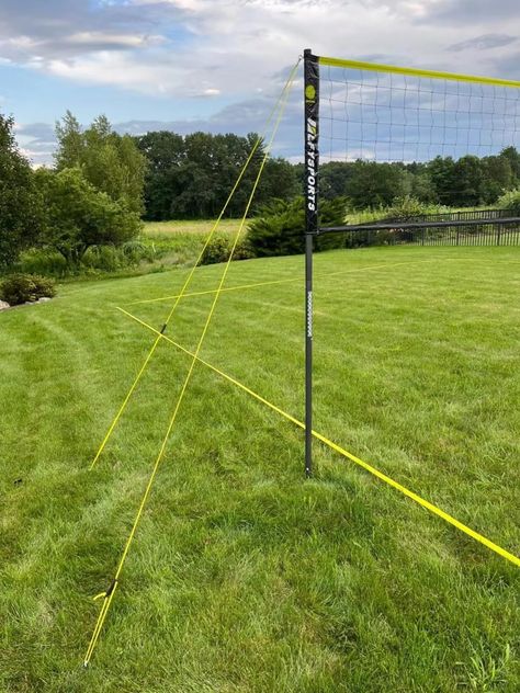 PRICES MAY VARY. Super Sturdy Construction: The heavy duty volleyball net set system adopt powder-coated thick steel poles, durable guy line with handles and 12-inch steel ground stakes and reinforced sleeve net, ensuring its stability while you are enjoying your game. Push-bottom poles design help you assemble easily without any tools. Standard Durable Volleyball Net: Our LFYSPORTS regulation size volleyball net for backyard (32'L×3'H) has double stitching, reinforced 4” net sleeves and binding Volleyball Court Backyard, Portable Volleyball Net, Outdoor Volleyball Net, Outdoor Volleyball, Volleyball Nets, Volleyball Equipment, Professional Volleyball, Volleyball Set, Net Sleeves