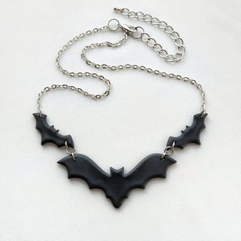 Halloween bats necklace.The size of the bats is about 2.4 and 1.2 inches (6 and 3 cm).The length of the necklace in the photo is 16 in (40 cm). You can also choose another length when ordering.Material: polymer clayOther necklaces you can see here: https://www.etsy.com/shop/RinaStudioDesign?section_id=24005632• Submersion in water is not recommended for polymer clay as this will quickly deteriorate the product. It is recommended that you remove the necklace prior to swimming or showering to exte Halloween Resin Jewelry, Polymer Clay Bat Earrings, Halloween Clay Jewelry, Goth Clay Earrings, Polymer Clay Necklaces, Halloween Jewelry Diy Ideas, Goth Polymer Clay, Halloween Polymer Clay Ideas, Halloween Clay Crafts