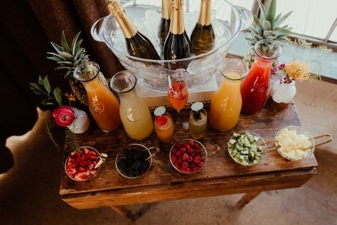 Tropical mimosa bar Sangria And Mimosa Bar, Classy Mimosa Bar, Outdoor Mimosa Bar, Tropical Mimosa Bar, Momosa Mimosa Bar, Wedding Drink Station Ideas, Bride Breakfast, Brunch Mimosa Bar, Tropical Mimosa