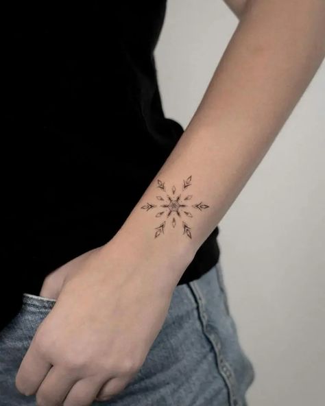 101 Best Snowflake Tattoo Ideas You Have To See To Believe! - Outsons Snowflake Tattoo Black, Snowflakes Tattoo, Small Snowflake Tattoo, Wrist Tattoo Design, Snowflake Tattoos, Feather Tattoo Wrist, Inner Wrist Tattoos, Snowflake Tattoo, Mandala Wrist Tattoo