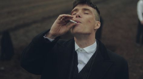 Tommy Shelby is almost never without a cigarette in hand in Peaky Blinders, puffing away pensively as he devises ways to outmanoeuvre his rivals.
 
 “People did smoke all day [back then] and it just became a Tommy thing,” Cillian explained of his character’s habit. Thomas Shelby, Cillian Murphy, Peaky Blinders, A Man, White, Black