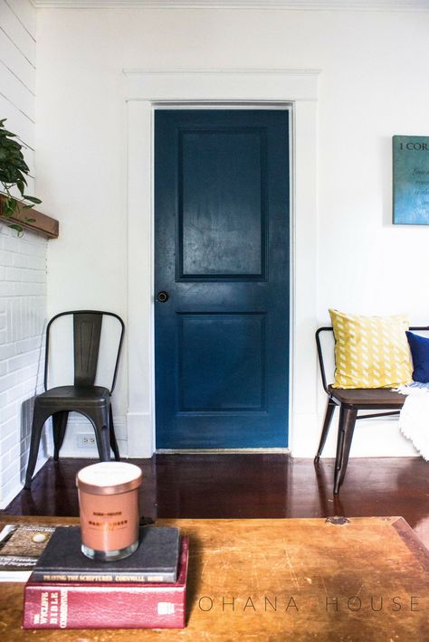 Navy blue interior doors add a pop of color to white walls, making your white walls look intentional. This color is also super versatile when it comes to deciding on a home decor style! White Walls Navy Trim, Dark Blue Doors Interior, Navy Blue Doors Interior, Navy Blue Interior Doors, Navy Interior Doors, Blue Painted Door, Blue Interior Doors, Navy Blue Interior, Berlin Style