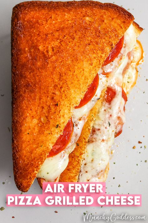 Air Fryer Pizza Grilled Cheese sandwich halves stacked on top of each other exposing melted cheese and pepperoni. Panini In Air Fryer, Air Fryer Sandwich Melts, Air Fryer Toasted Cheese Sandwich, Air Fryer Sandwich Recipes, Air Fryer Sandwiches, Deep Fried Pizza, Pizza Grilled Cheese Sandwich, Sandwich Melts, Pizza Sandwich Recipe