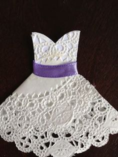 About 2 weeks ago, I promised you a tutorial on how to make the doily wedding dresses that I made for my cousin's shower invitations. Well, ... Doily Dress, Diy Doily, Dress Templates, Origami Bowl, Doily Wedding, Wedding Shower Cards, Doilies Crafts, Dress Card, Dress Tutorial