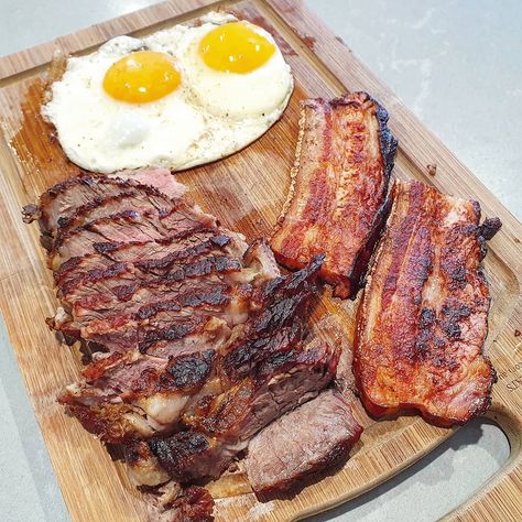 Up and at 'em folks, it's breakfast time! How about bacon, eggs AND ribeye? 😋 🥚 🥚 📸 @danketoman 🤩BREAKFAST🤩 🍽Ribeye, bacon & eggs🍽 🤤🥩🥓🍳❤💪🏽 🥚 🥚 #danketoman #steakandeggs #🥚 #bbqbreakfast #ketofood #ketosis #bacon #pancakes #steak #barbeque #asado #churrasco #sizzle #paleo #meatlover #brisket #beefbrisket #eggs #bbq #breakfast #breakfastofchampions #bbqeggs #bbqlads #bbqtime #foodlover #wakeup #eggpop 🥚 🥚 🤙 Tag your breakfast buddies! 🤙 Fatty Steak, Steak And Eggs Breakfast, Gym Foods, Bbq Breakfast, Ancestral Diet, Steak Breakfast, Bacon Pancakes, Primal Diet, Country Breakfast