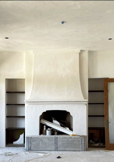 French Plaster Fireplace, Plaster Fireplace With Raised Hearth, Extra Tall Fireplace, Fireplace With Windows Above, Arched Plaster Fireplace, Arched Fireplace Mantle, Tudor Style Fireplace, Asymmetrical Fireplace Wall, Plaster Mantle