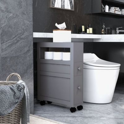 This slim bathroom storage cabinet features a shelf and two drawers, providing ample space for towels and cleaning supplies, helping to keep the area organized. STYLISH | STYLISH 6.25" X 20.5" X 28.25" Wood Rolling Narrow Bathroom Side Storage Cabinet Brown, Manufactured wood | Organization | TKJS5431 | Wayfair Canada Narrow Bathroom Storage Cabinet, Narrow Bathroom Storage, Slim Bathroom Storage Cabinet, Slim Storage Cabinet, Slim Bathroom, Second Bathroom, Slim Bathroom Storage, Minimize Clutter, Narrow Storage Cabinet