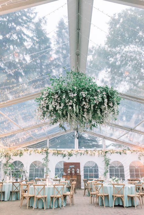 we love this spring wedding idea! A floral chandelier to make your guests feel the romantic vibe Romantic Pastel Wedding, Floral Chandelier Wedding, Green Chandeliers, Clear Tent, Country Wedding Venues, Pastel Clouds, Wedding Chandelier, Tent Design, Floral Chandelier