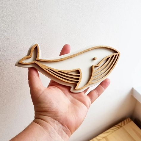 🐋 LAUNCHING SUNDAY 28TH JULY - 19.30 FOR VIP MEMBERS 20.00 EVERYONE ELSE. 🐋 The whale minis! These little guys are adorable. This one is made from some lovely Beechwood. But I only had enough wood to make 1 whale and 1 turtle! So it's just these two for the release. They may be a permanent addition to the shop but I can't guarantee as I might not be able to source the wood again. So if you want one....set those reminders and make sure your a member of my VIP club. These adorable whales make... Trofast Ikea, Wood Whale, Baby Hunter, Diy Laser Cut, Laser Cut Screens, Wooden Whale, Vip Club, Laser Art, Cnc Design