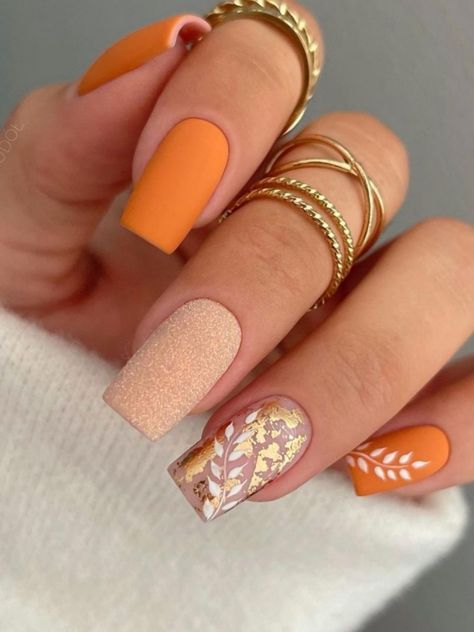 burnt orange acrylic nails with glitter and fall leaves Orange Nail Designs, Orange Nail, Nail Art For Beginners, Sweater Nails, Trendy Nail Art Designs, Geometric Nail, Simple Nail Art Designs, Best Nail Polish, Thanksgiving Nails