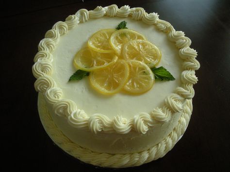 Lemon cake - Lemon cake with lemon curd filling and vanilla buttercream. It is garnished with candied lemon slices and mint leaves. This is a gluten free cake.  This is the same photo as the other, but that didn't survive the transfer to the new site design. Rather than delete I'm leaving it up so people won't lose it if they marked it a favorite. Lemon Cake Recipes, Baking Recipes Cupcakes, Fluff Cake, Best Lemon Cake, Lemon Cake With Lemon Curd, Cake With Lemon Curd Filling, Basic Buttercream Recipe, Best Lemon Cake Recipe, Lemon Fluff