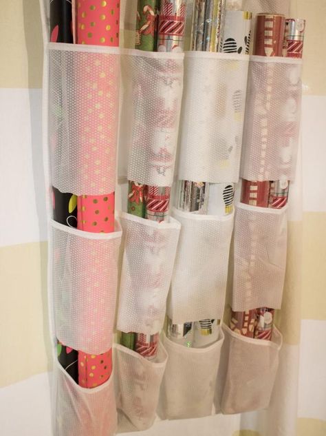 14 Ways to Organize Your Wrapping Paper and Gift Bags | HGTV Gift Bag Organization, Gift Bag Storage, Wrapping Paper Organization, Gift Wrap Organization, Craft Paper Storage, Wrapping Paper Storage, Gift Wrap Storage, Wrapping Station, Diy Wrap