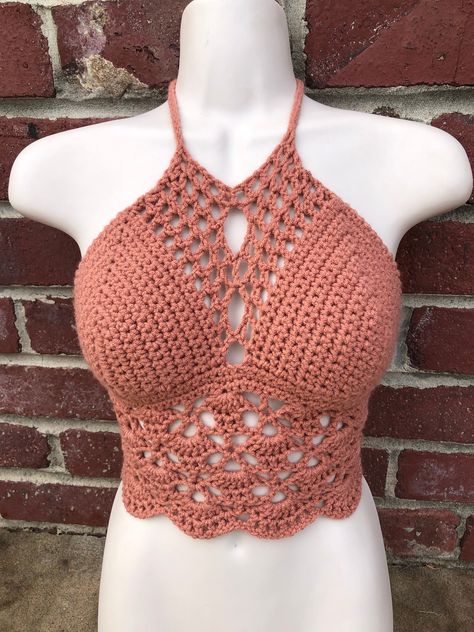 Handmade rose pink crochet halter crop top  with cute high neck lace design.  One-of-a-kind freehanded pattern! Very stretchy and adjustable and fits a variety of different sizes and shapes. Also made with thick and sturdy triple back ties and neck ties. Perfect for spring, summer, concerts, raves, festivals or just everyday wear! Photos taken in natural lighting Crochet Top Halter, Crochet Patchwork Blanket, Crochet Fall Decor, Top Crop Tejido En Crochet, Blouse Tops Designs, Summer Concerts, Crochet Bookmark Pattern, Crochet Wearables, Crochet Skull