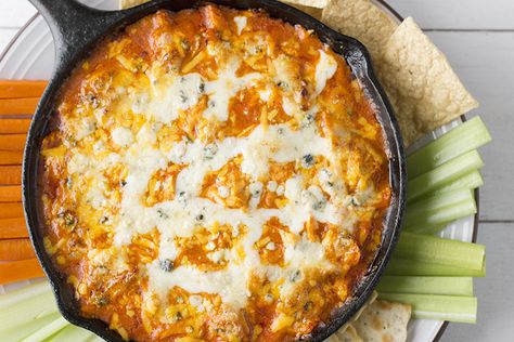 No Bone to Pick Here: Easy Layered Buffalo Chicken Dip Recipe - So Good Blog Buffalo Chicken Recipes Easy, Baked Buffalo Chicken Dip, Wing Dip, Blue Cheese Chicken, Chicken Wing Dip, Buffalo Chicken Nachos, Buffalo Chicken Dip Easy, Buffalo Chicken Recipes, Chicken Dip Recipe