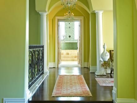 Designer Shelly Riehl David uses a pale avocado in this sophisticated walkway to create a fresh and inviting atmosphere. Try Dutch Boy's Marsh Green to achieve a similar look. Chartreuse Decor, Transitional Entryway, Hall Colour, Double Bed Designs, Green Hallway, Trending Paint Colors, Celery Green, Bright Walls, Transitional Living