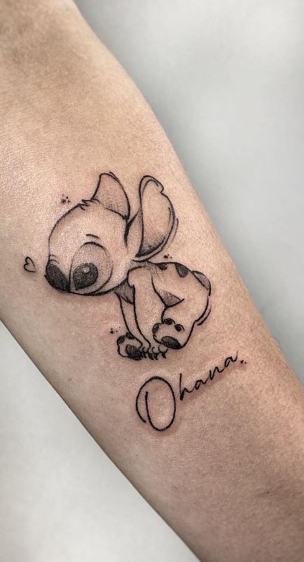 Embrace Ohana Spirit: Top 19 Lilo & Stitch Tattoo Designs of 2024 – Discover Now! Mother Daughter Ohana Tattoos, Disney Character Tattoos Ideas, Ohana Tattoo For Men, Ohana Means Family Tattoo, Stitch Ohana Tattoo, Ohana Stitch Tattoo, Lilo And Stitch Tattoo Ideas, Lilo Stitch Tattoo, Tattoos Practice