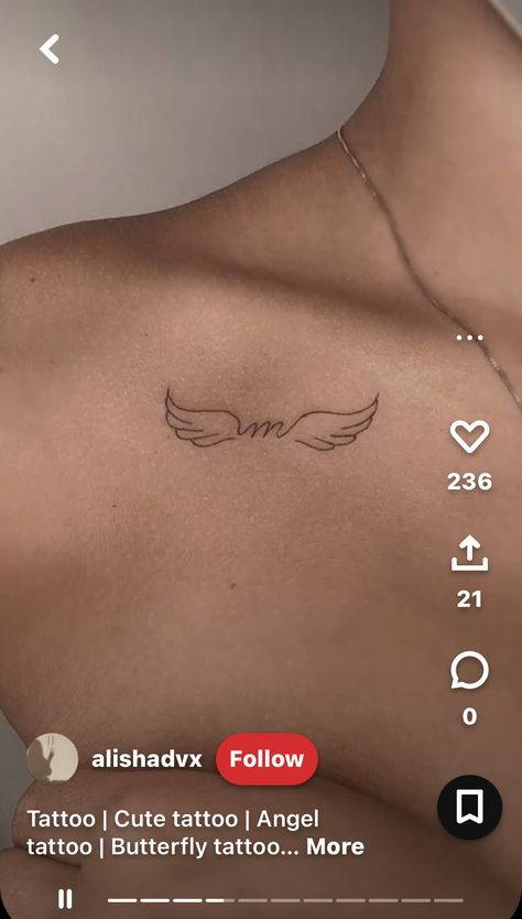 Cute Tattoos For A Lost Loved One, Angel Wings Initial Tattoo Small, Wings With Letter Tattoo, M With Angel Wings Tattoo, Finger Tattoos Angel Wings, Small Dainty Angel Wing Tattoo, Tatoos Lost Loved One, Angel Wing With Name Tattoo, Tattoo Ideas For A Lost Loved One Angel Wings