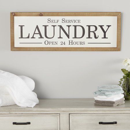 The laundry room may be the most neglected room of the house... That's why we made charming Farmhouse style laundry signs such as this metal and wood decor! The iron LAUNDRY sign is finished is glossy white paint with the relief lettering finished in dark brown paint. Above LAUNDRY read SELF SERVICE and beneath reads OPEN 24 HOURS. It's constructed with iron, Chinese fir wood, and medium-density fiberboard (MDF) and hangs via two toothed backings. A jute rope also works as a hanging thread with Laundry Wall Decor, Laundry Wall, Laundry Room Sign, Laundry Sign, White Laundry, Laundry Room Signs, Laundry Signs, Laundry Decor, White Wall Decor