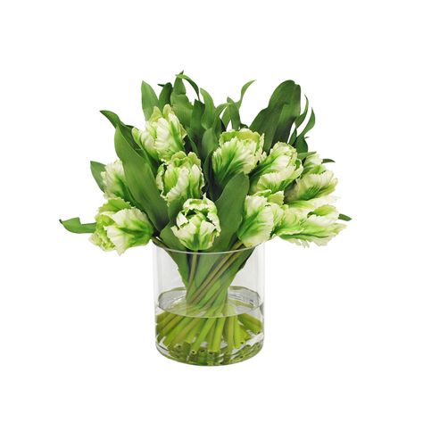 This stunning handmade tulip arrangement looks classic any time of year! Set in a cylinder glass vase, these textural tulips are perfect for a coffee table, console, entryway, or countertop. Specs & Care Everlasting handmade floral arrangement Life-like and realistic Size: 16" W x 16" D x 15" H Color: white, green Set in a cylinder glass vase Tulips Vase, Tulip Centerpiece, Silk Tulips, Tulips Arrangement, Tulips In Vase, Faux Flower Arrangements, Tulip Bouquet, White Vase, Cylinder Vase