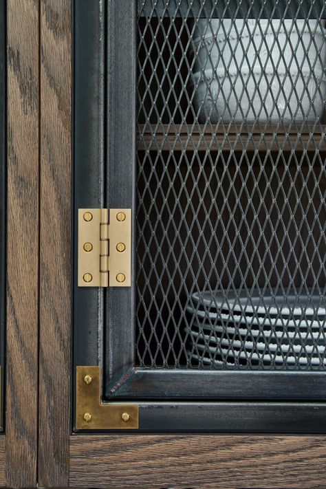 Close up shot of steel tube & mesh kitchen wall cabinet doors with brass hinges & detailing Industrial Bar Cabinet, Industrial Cabinet Design, Metal Mesh Cabinet Doors, Industrial Interior Design Kitchen, Steel Mesh Door, Wire Mesh Cabinet Doors, Hetherington Newman, Metal Mesh Cabinet, Industrial Kitchen Cabinets