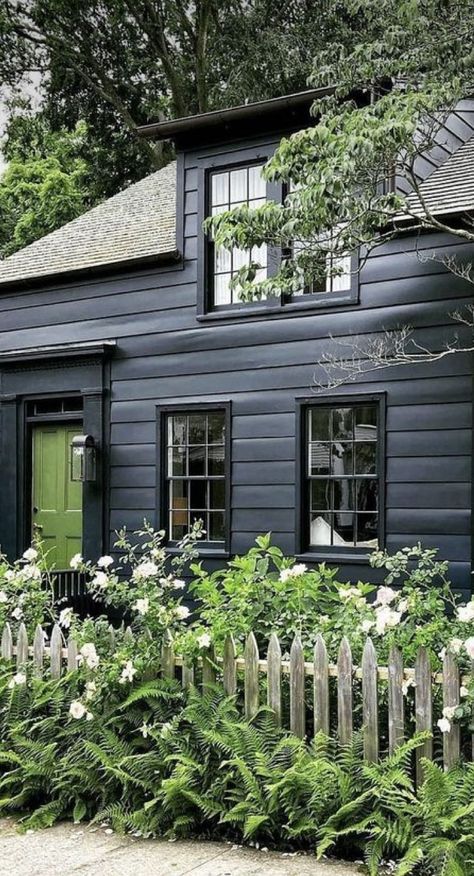 Black Exterior Cottage, Black House Green Door, Cottage Exterior Makeover, Witchy House Exterior, Scandinavian Cottage Exterior, Black Cabins, Black Exteriors, Lake House Paint Colors, Best Exterior House Paint