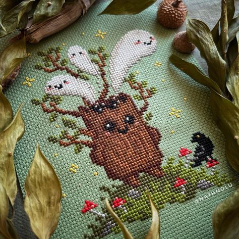 Delve into the enchanting world with this Spirited Stump Cross Stitch Pattern. This instant download PDF features a gothic and witchy design inspired by woodland mystical demons and magic forests. Stitch whimsical elements like ghosts, mushrooms, raven, and cute witchcraft motifs to create a dark cottagecore aesthetic. Perfect for adding a touch of spooky charm to your home decor or witchcraft-themed projects. Beginner friendly.  This digital pattern is in PDF format for download (not a paper pa Witchcraft Embroidery, Raven Cute, Cute Witchcraft, Demon Magic, Holiday Cross Stitch Patterns, Halloween Cross Stitches, Magic Forest, Dmc Floss, Stitching Art