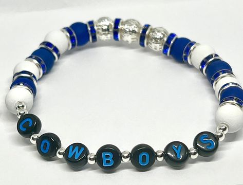 Experience awesomeness! Introducing Dallas Cowboy Football Bead Bracelets - Handcrafted Fan Accessories, available now at an amazing price of $10.00 #SportsJewelry #DallasCowboys #AcrylicBeads #StretchyBeads #SilverFiligreeBead #PolymerClayBeads #TeamSpirit #BlueWhiteSilver #TexasBracelets #FashionJewelry Cowboy Football, Dallas Cowboy, Sports Jewelry, Dallas Cowboys Football, Cowboys Football, Fan Accessories, Bead Bracelets, Polymer Clay Beads, Silver Filigree