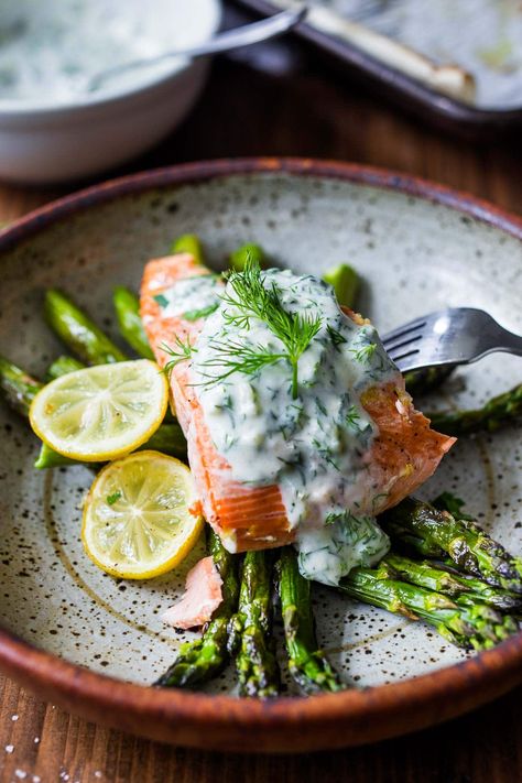 This recipe for Salmon with Dill Sauce is so simple and easy, yet full of delicious flavor. Bake it in the oven, in under 30 minutes! A healthy, spring-inspired dinner, perfect for busy weeknights when time is short. Baked Salmon With Dill, Salmon With Dill Sauce, Simple Baked Salmon, Salmon With Dill, Dill Sauce For Salmon, Feasting At Home, Sauce For Salmon, Easy Sheet Pan Dinners, Spring Dinner