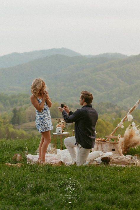 Marry Me Proposal Photo | The Ridge Asheville. Hi! I'm Kirsten! I am a Wedding and Elopement photographer based out of Asheville, NC that is ready to travel anywhere to capture your love story. The perfect location for your mountain proposal! Find my favorite proposal photo to capture with these outdoor mountain proposal ideas, the Ridge Asheville mountain top, and boho mountain photos. Book me to capture this special moment at kirstenalexandriaphotography.com Wedding Proposals Mountains, Travel Proposal Ideas, Ranch Proposal Ideas, Engagement Moment Photos, Simple Nature Proposal, Proposal Ideas Forest, Purpose Ideas Engagement, Proposal Ideas Mountains, Mountain Proposal Ideas