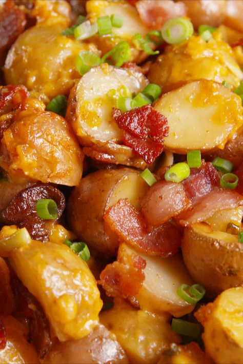 Loaded Slow-Cooker Potatoes - Delish.com Loaded Slow Cooker Potatoes, Slow Cooker Potatoes, Crock Pot Potatoes, Thanksgiving Recipes Side Dishes, Crockpot Dishes, Cooking Spray, Potato Recipe, Food Snacks, Crock Pot Slow Cooker