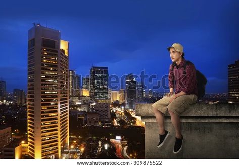 Find Male Tourist Sitting On Building Rooftop stock images in HD and millions of other royalty-free stock photos, illustrations and vectors in the Shutterstock collection. Thousands of new, high-quality pictures added every day. Sitting On Top Of Building, On Top Of Building, Top Of Building, Building Rooftop, Night Time, New York Skyline, Photo Editing, Photo Image, Every Day