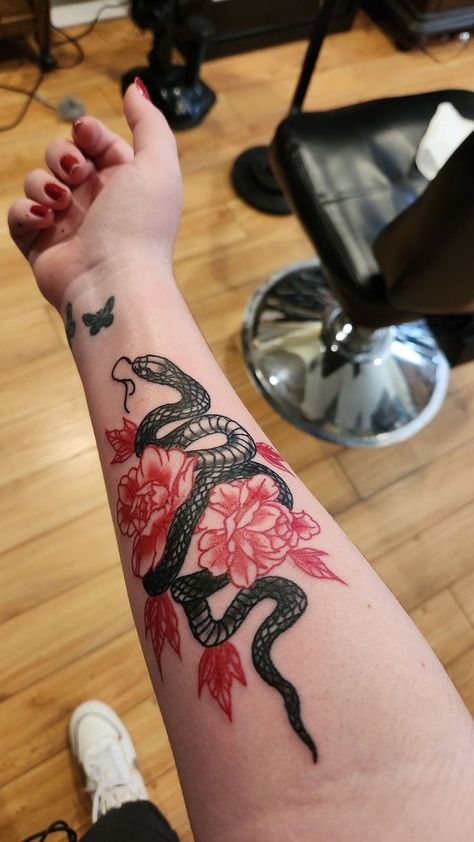 Black Tattoos With Red Accent, Red Ink Floral Tattoo, Snake Arm Tattoo Women, Black And Red Ink Tattoo, Red And Black Snake Tattoo, Black And Red Snake Tattoo, Red Ink Snake Tattoo, Red And Black Ink Tattoos, Floral Snake Tattoo