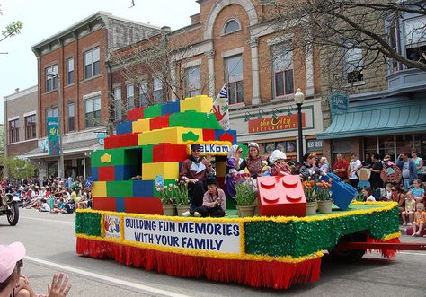 Lego Float | Colorful Lego Float in the Children's Parade. | Terry Zweering | Flickr                                                                                                                                                                                 More Kids Parade Floats, Holiday Parade Floats, Parade Float Diy, Parade Float Theme, Halloween Parade Float, Painted Cardboard, Christmas Parade Floats, Homecoming Floats, Marketing Website Design