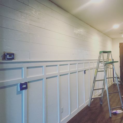 Shiplap wall DIY with board and batten. Painted in Behr Maui Mist Board And Batten Wall With Shiplap, Board And Batten With Shiplap Together, Board And Batten Shiplap Wall, Board And Batten With Shiplap Above, Shiplap With Board And Batten, Board And Batten With Shiplap, Shiplap And Board And Batten Together, Shiplap With Wainscoting, Partial Shiplap Wall