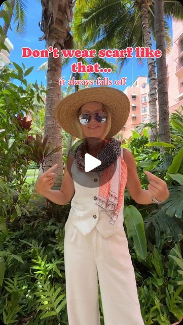 Monica D 🌺 Hawaii 🏖 Beach on Instagram: "Let’s try to dress up this linen suit with a scarf!
*
Im actually using one of my sarongs , its a thinner one , it’s just like a scarf / shawl . I wanted to create sleeves to cover my arms as Im wearing a vest , you can do this scarf hack with a sleeveless top as well . Loop it around your neck , if you don’t want to do that , you can just place the scarf behind your neck and then try to squeeze it under a vest or a sleeveless top , covering each arm with the scarf , tie ends on your wrists, that will create sleeves. Wearing it this way,  your scarf always stays in place, your arms are covered, you don’t have to fix your scarf all the time and your hands are free! What do you think ?
*
Comment SCARF for outfit details 🔗
*
this suit is $38 !" Casual Beach Scarf, How To Wear A Scarf With A Sleeveless Dress, Scarf Top Beach Outfit, Trendy Summer Vacation Scarf, Casual Summer Scarves, One Size Fits Most, Tropical Countries, Scarf Tie, How To Wear A Scarf, Scarf Outfit