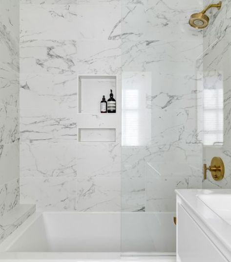 Shower with white marble-look tile with grey veining. Small White Bathrooms, Tile Tub Surround, Tiny Bath, Bathroom Makeovers, Shower Wall Tile, Wall Exterior, The Tile Shop, Bathroom Reno, Corner Shower