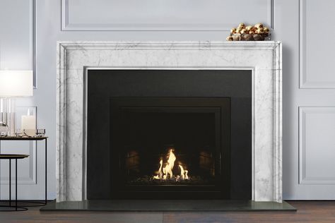 Contemporary marble fireplaces combining timeless elegance with the clean lines and minimalist design of modern-day architecture. Timeless Fireplace, Wood Mantle Fireplace, Marble Fireplace Mantel, Ventless Fireplace, Marble Fireplace Surround, Wood Mantle, Marble Block, Marble Fireplace, Fire Surround