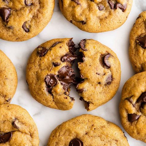 These pumpkin chocolate chip cookies are chewy on the outside and soft on the inside. They're perfectly sweet with just the right amount of cozy fall spices! These chocolate chip pumpkin cookies are easy to make, and will become your new favorite fall cookie recipe! Easy Pumpkin Chocolate Chip Cookies, Pumpkin Chocolate Chip Cookies Easy, Fall Cookie Recipes, Homemade Pumpkin Pie, Pumpkin Chocolate Chip Cookies, Pumpkin Chocolate Chips, Fall Cookies, Pumpkin Cookies, Pumpkin Chocolate