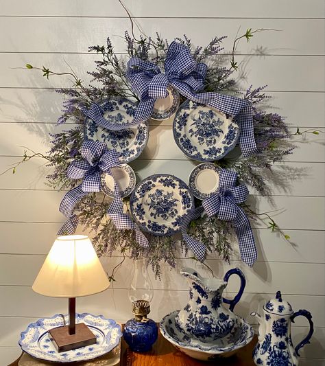 Blue Willow Plate Wreath, China Plate Wreaths, Wreath With Blue And White Plates, Metal Floral Wall Decor, Blue Willow Wall Display, Plate Wreath Craft, Wreath Made From China Plates, Wreath With Plates, How To Make A Plate Wreath