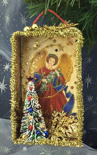 'Angel in Red' Christmas card shadow box | etsy.com/shop/Chr… | Flickr Vintage Angel Images, Christmas Shadowboxes, Matchbox Shrine, Diorama Ornaments, Red Christmas Card, Christmas Diorama, Vintage Christmas Crafts, Christmas Shadow Boxes, Christmas Crafty