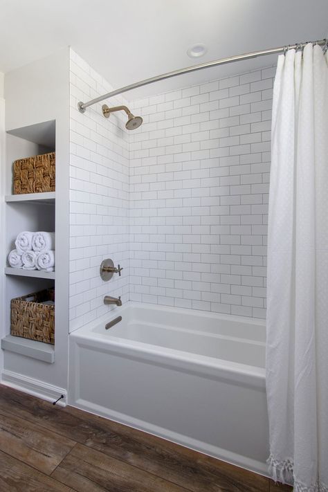 Subway Tile Bathroom Wood Floor, Tiled Bathroom Floors And Showers, Bathtub With Subway Tile, Bathroom Renovation With Tub, Bathrooms With Wood Tile Floors, Subway Tile Shower With Tub, Bathtub And Tile, Tub With Herringbone Tile Walls, Small Bathroom With Wood Floor