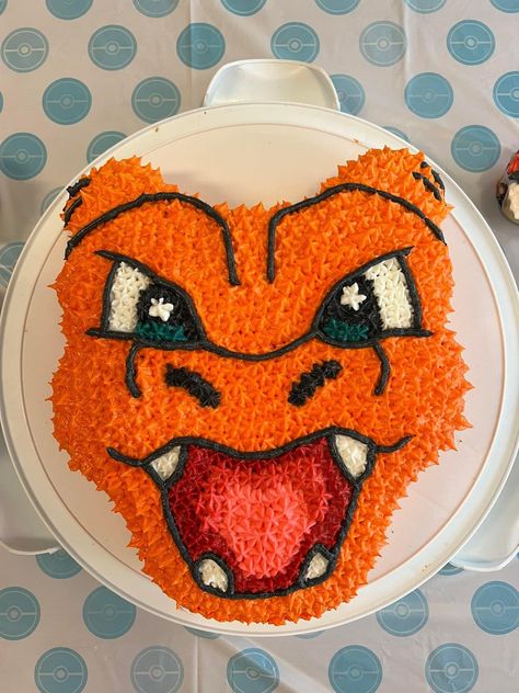 Charizard cake Charzard Birthday Cakes Easy, Charizard Cupcakes, Charmander Cupcakes, Charmander Birthday Cake, Pokemon Cake Charizard, Pokemon Pull Apart Cupcakes, Charzard Birthday Cakes, Charizard Birthday, Squirtle Cake