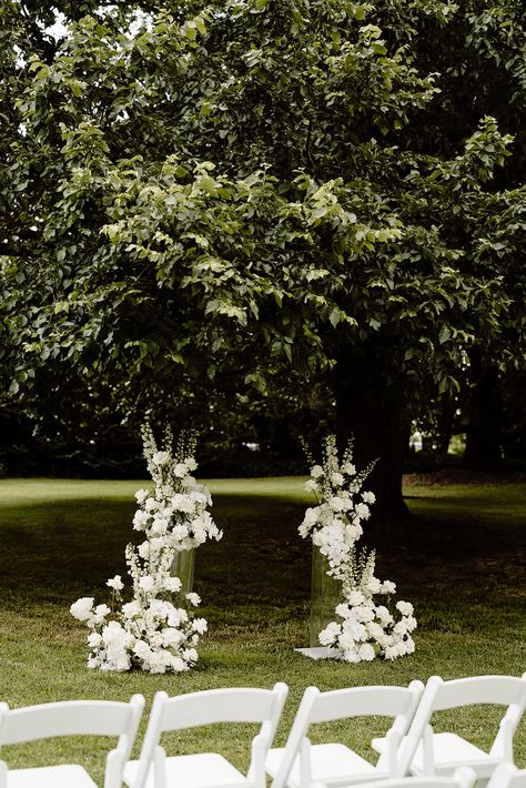 A Mewburn Park Wedding: Heritage Meets Contemporary Wedding Ceremony Florals Altars, Pedestal Arch Wedding, Wedding Altar Pedestal Flowers, Floral Alter Wedding, Wedding Altar Decorations Outdoor, Wedding Alter Ideas Outside, White Flower Wedding Ceremony, Flowers Ceremony Wedding, Flower Garden Wedding Ceremony