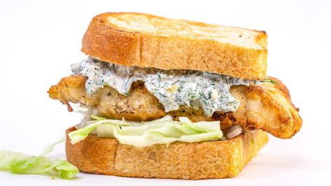 Golden battered white fish fillets with a creamy, punched-up tartar sauce — what's not to love about this spin on the classic fish sandwich? Fried Fish Sandwich, Rachel Ray Recipes, Week Meals, Seafood Meals, Rachael Ray Recipes, Fish Sandwich, Sandwich Board, Rachel Ray, Fish Fry