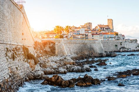 View of rocky shores and old town of Antibes South of France. Antibes France, Girls Getaway, Top Restaurants, The South Of France, South Of France, Best Restaurants, The South, Paris Skyline, Favorite Places