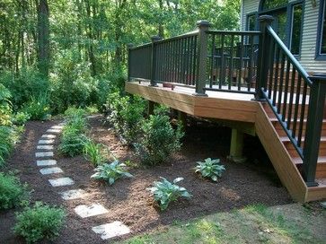 lovely Gardens Around Decks, Mulch Around Deck, Landscaping Around High Decks, Landscaping Around Tall Deck, Landscaping Around Front Deck, Landscaping Around Raised Patio, Landscaping By Deck, Deck Landscape Ideas, Tall Deck Landscaping Ideas