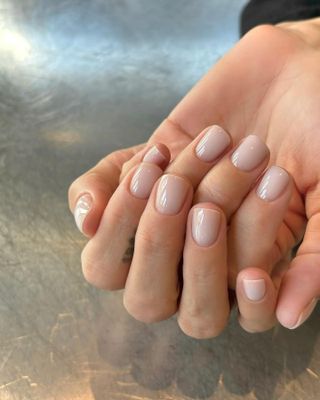 "Coconut" Nails Is the Chicest Nail Trend to Try This August | Who What Wear Funny Bunny Manicure, Neutral Beach Nails, Coconut Nails, Funny Bunny Nail, Coconuts Over Opi, Funny Bunny Nails, Taupe Nail Polish, Silk Nails, Taupe Nails