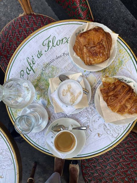 Croissant and Coffee sitting on table of Café de Flore in Paris- favorite places to eat with a view | La Vie on Grand French Dinner Parties, Where To Eat In Paris, Parisian Breakfast, Paris In April, Eat In Paris, Beef Carpaccio, Parisian Bistro, Pretty Coffee, French Lifestyle